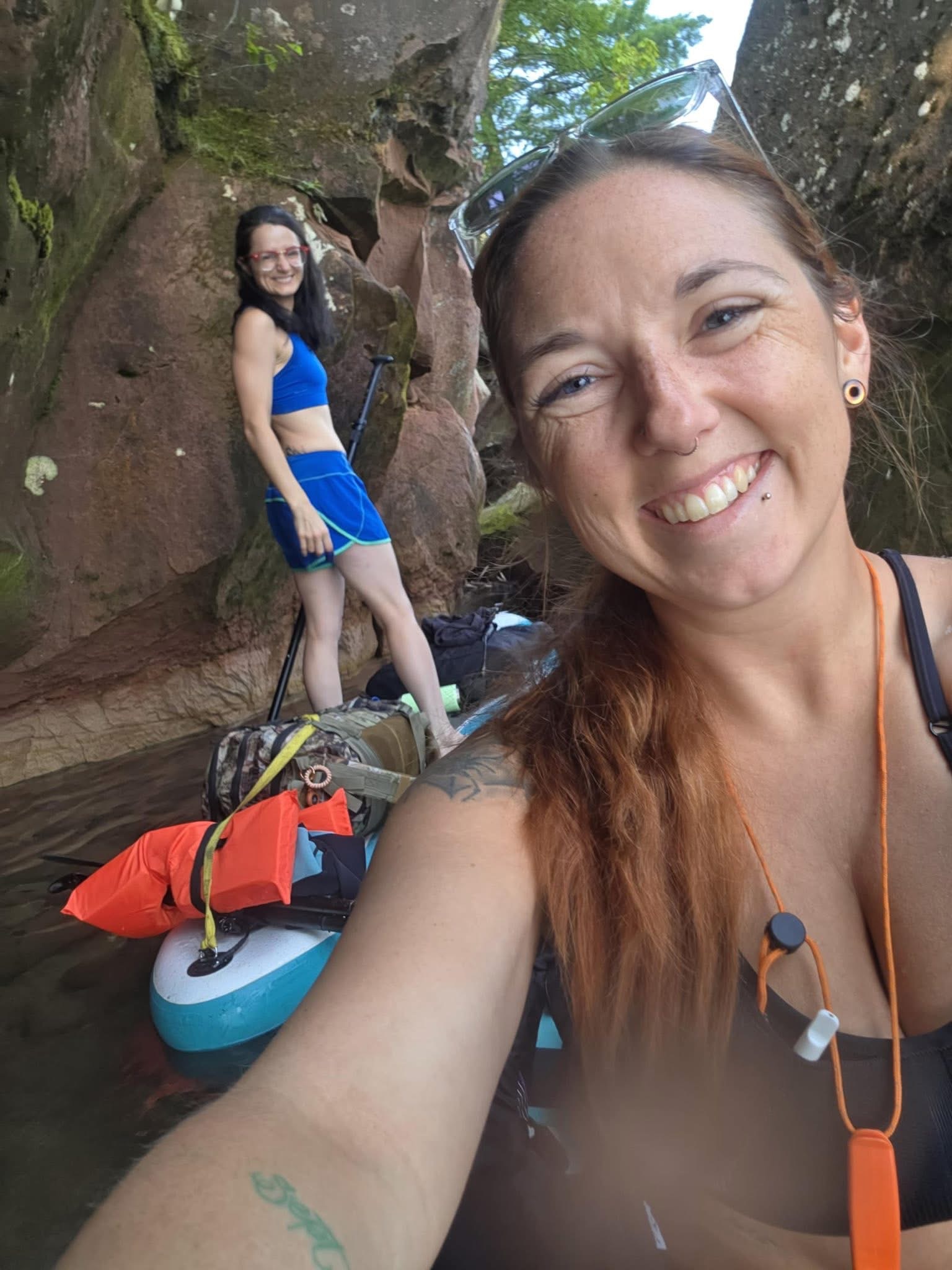 Ashley and Brittany exploring red sandstone formations